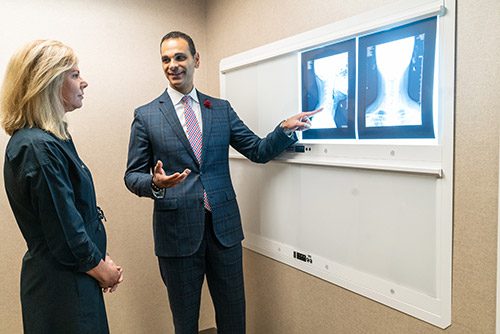 Dr Mark Mikhael with patient