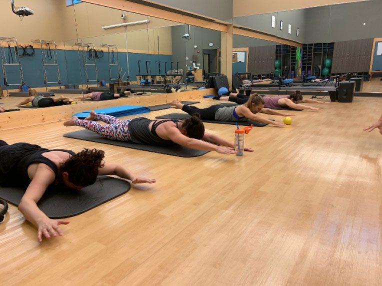 Pilates swimming position