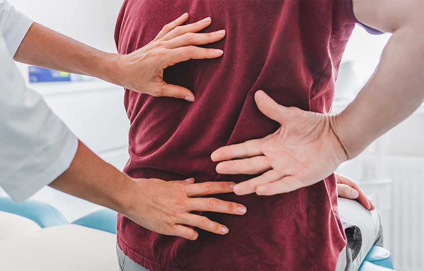 Doctor checking spine