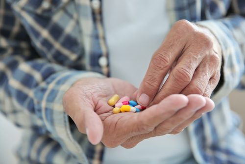 Before ankle reconstruction surgery, Dave had to take pain medication just to cope with his severe ankle pain.